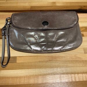 Metallic gold coach wristlet